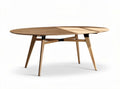 Oval wooden dining table with tapered legs for modern interiors 200 x 100 x 75cm